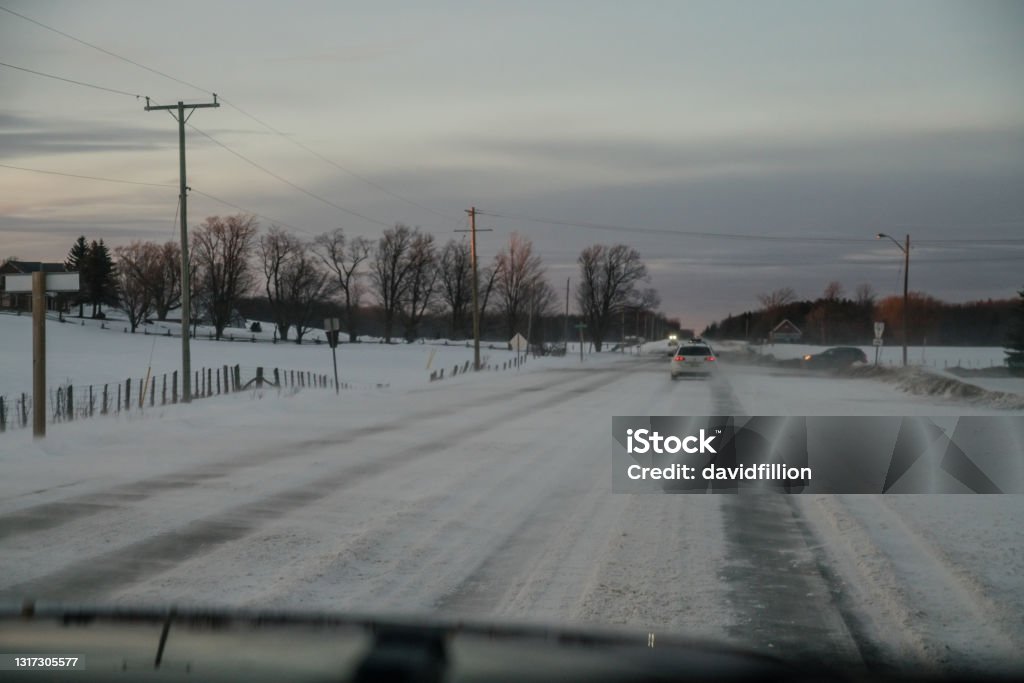 Winter Landscape - Driving in a Snow Squall Snow Stock Photo