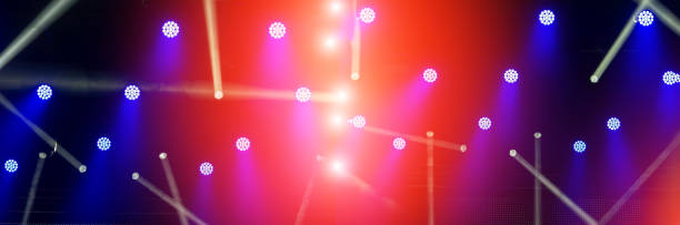 istock stage of spotlights during a rock concert. 1317305591