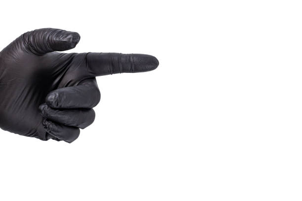 Mans hand in black glove indicates direction with forefinger, banner or flyer mockup
