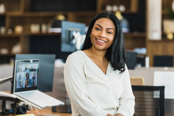 istock Female CEO smiles for camera 1317309584