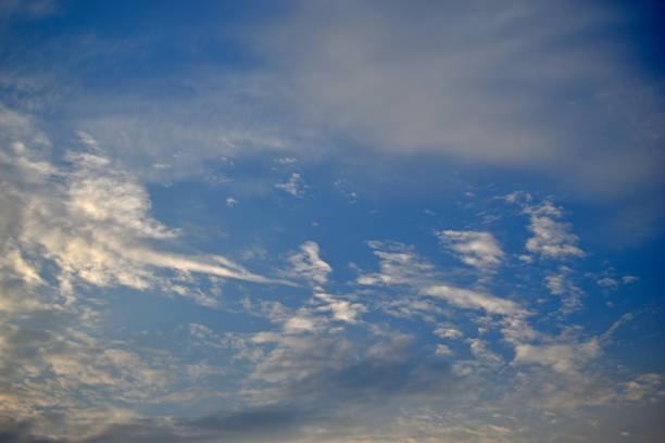istock Evening sunset yellow blue sky with clouds 1317309605