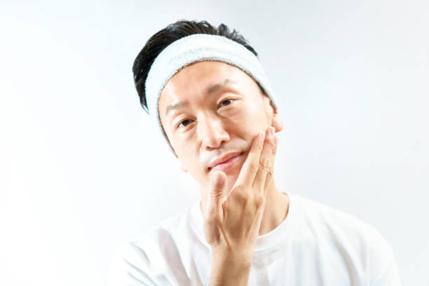 istock Middle-aged man doing skin care 1317312296