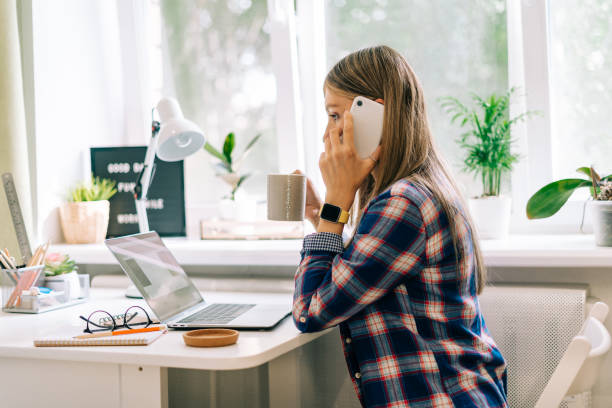 istock woman typing on computer while sitting at home 1317314275