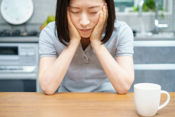 istock Middle aged woman with a tired look 1317315200