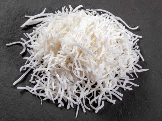 istock Grated coconut on top of stone 1317315251