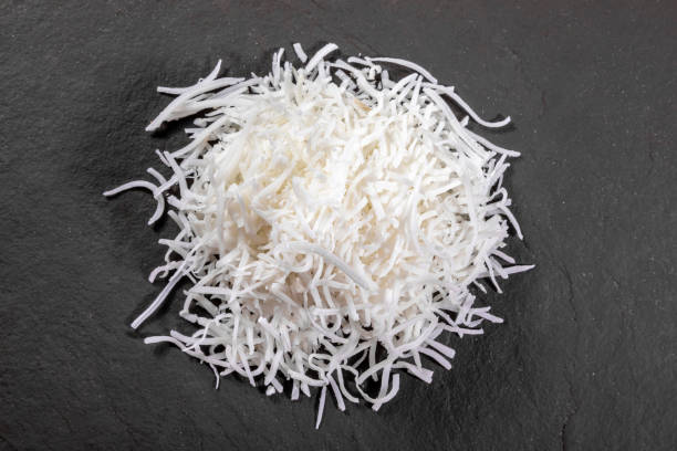istock Grated coconut on top of stone 1317315397