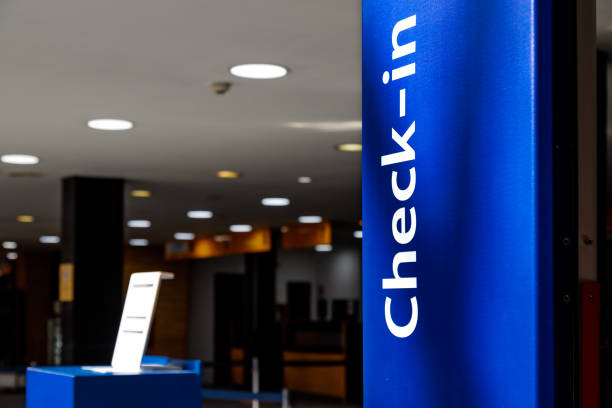 istock Check-in sign at an empty airport 1317335962