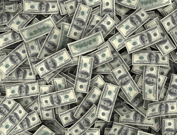 istock Money background top view 1317337887