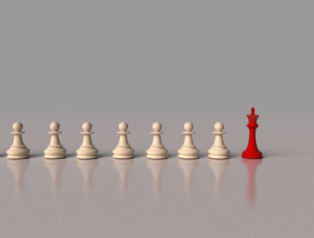 istock Red chess king leading white pawns business concept 1317337888