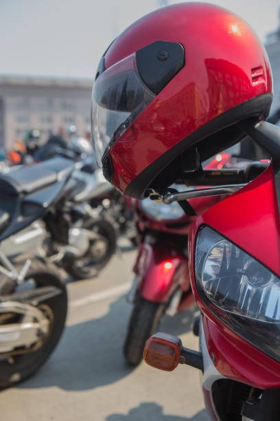 istock Motorcycle helmet on the handlebars of a motorcycle 1317340371