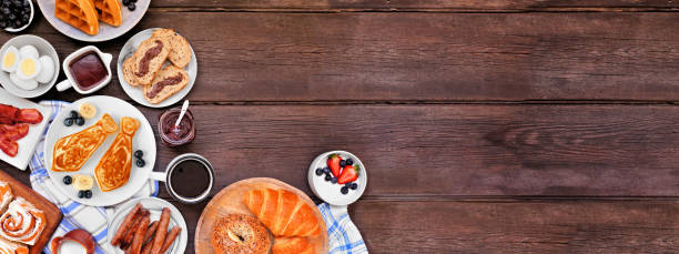 istock Fathers Day brunch corner border. Overhead view on a dark wood banner background. 1317341949