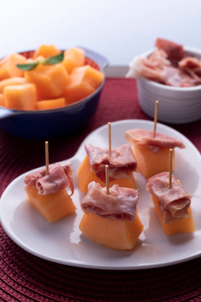istock Cantaloupe and prosicutto stick 1317342822