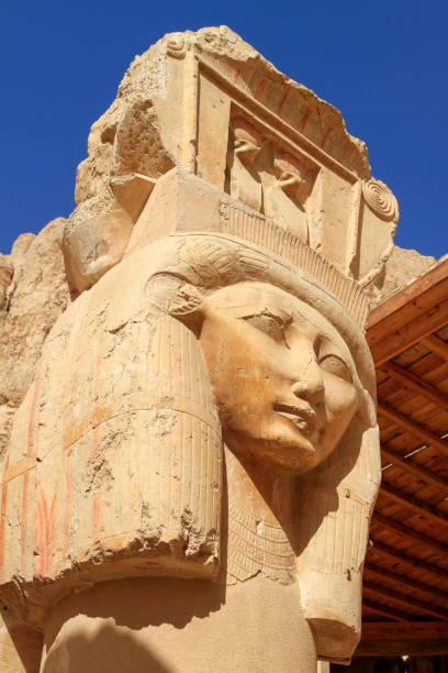 Carved Hathor column at Mortuary Temple of Hatshepsut, or Djeser-Djeseru, near Valley of the Kings, Upper Egypt Carved Hathor column at Mortuary Temple of Hatshepsut, or Djeser-Djeseru, near Valley of the Kings, Upper Egypt queen hatshepsut stock pictures, royalty-free photos & images