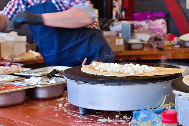 istock cooking pancakes with cheese on electric stove 1317347423