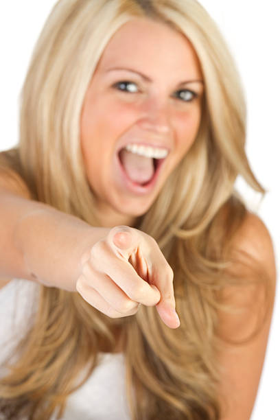 istock young adult pointing at camera 131735014