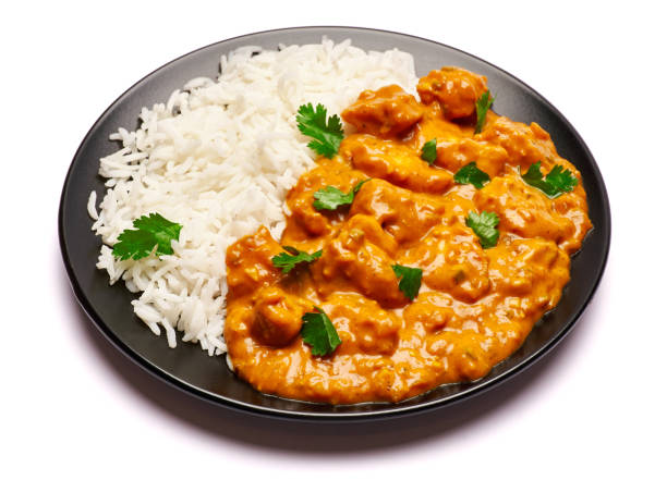 istock Plate of Traditional Chicken Curry isolated on white background with clipping path embedded 1317362205