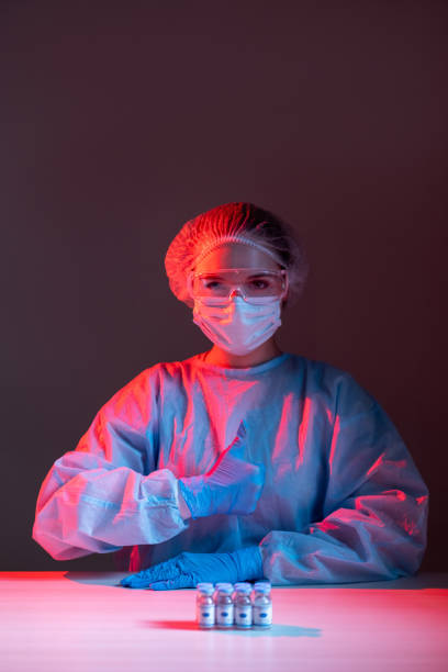 istock approved vaccine stop pandemic satisfied scientist 1317362746