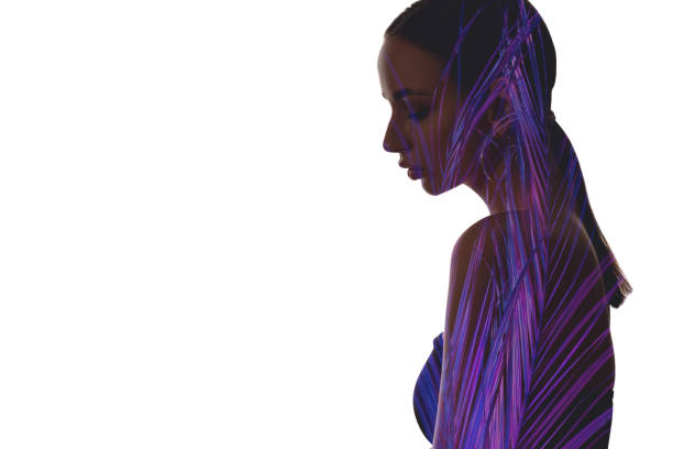 istock double exposure silhouette neon tropical woman 1317362757