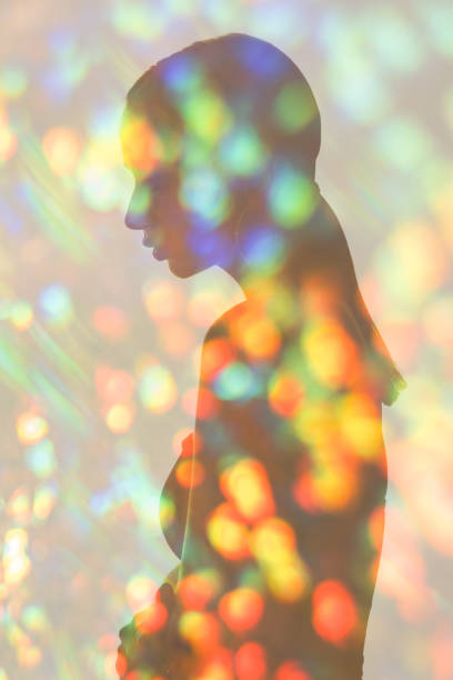 istock double exposure silhouette woman in bokeh light 1317362758