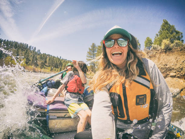 Camping and rafting with moms in California A couple take their children on a white water rafting camping trip in California. northern california photos stock pictures, royalty-free photos & images