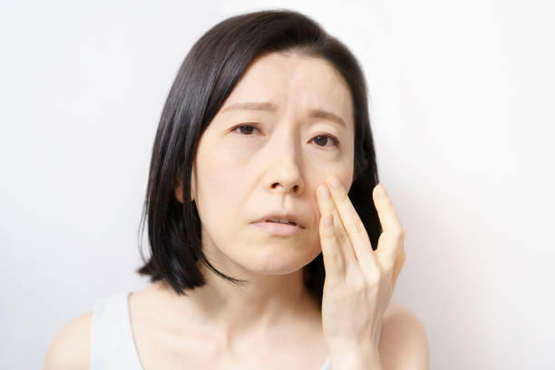 istock Middle-aged woman suffering from skin problems 1317368034