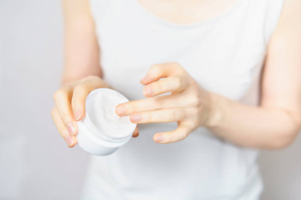 istock Middle-aged woman picking up cream 1317368787