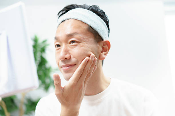 istock Men doing skin care in the room 1317370653
