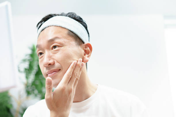 istock Men doing skin care in the room 1317370689