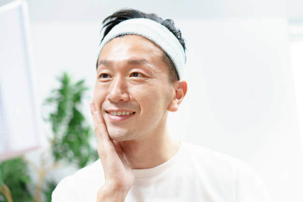 istock Men doing skin care in the room 1317370709