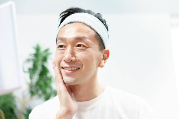 istock Men doing skin care in the room 1317370730