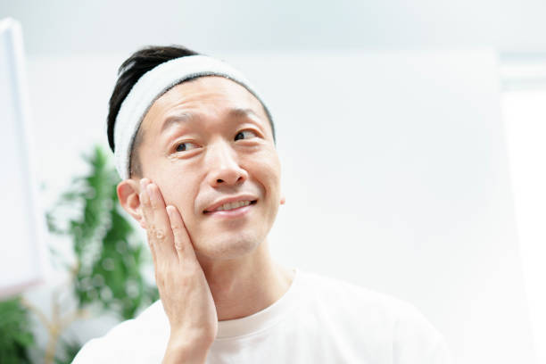 istock Men doing skin care in the room 1317370752