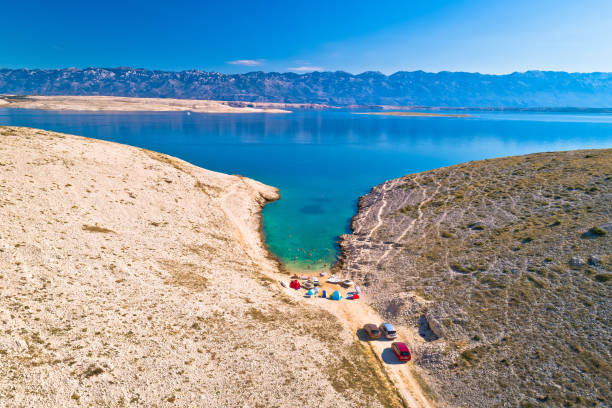Vrsi. Zadar archipelago idyllic cove beach in stone desert scenery near Zecevo island, Dalmatia region of Croatia