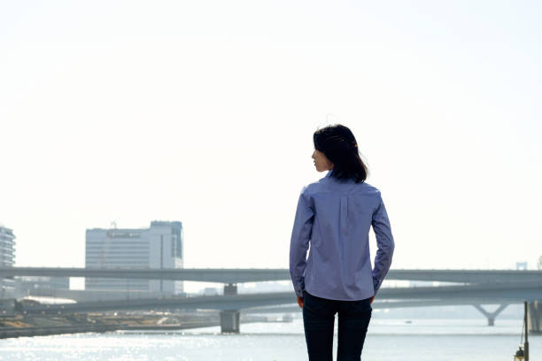 Businesswoman contemplating and planning about way to go