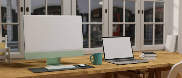 istock Comfortable workspace with computer, laptop and supplies the table beside the window, 3D rendering 1317375633