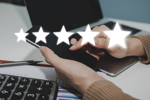 istock 5 star rating. woman hand working on mobile phone with five star button on visual screen to review good rating, digital marketing, good experience, positive thinking and customer feedback concept 1317380375