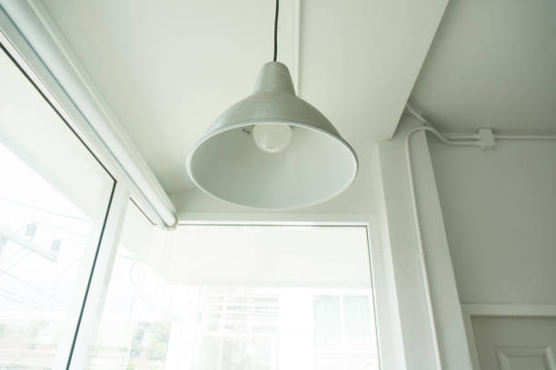 istock Lighting lamp with bulbs light with white room in home. 1317380481