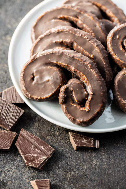 istock Sweet pastry palmeritas with chocolate icing. 1317381118