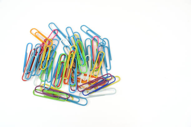 istock Pile of paper clips on a white background 1317381428