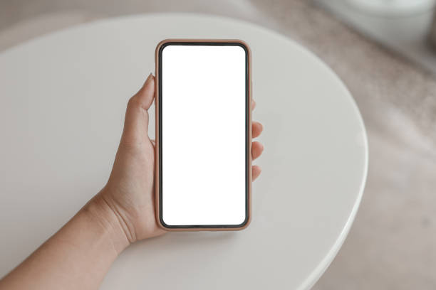 istock Women's hands holding cell telephone blank copy space screen. smart phone with technology concept 1317382240