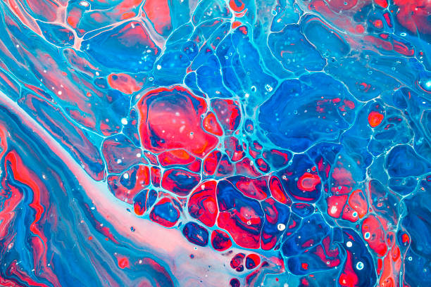 istock multicolor paint spilled onto the canvas, creating an interesting abstract drawing, a pattern of lines, halftones, causing different associations in your design. fluid art 1317384431