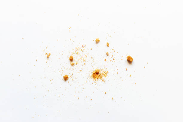 istock scattered crumbs of white bread rusks on a light background 1317384592