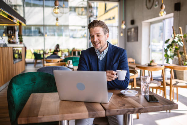 istock Business man in a cafe 1317386787