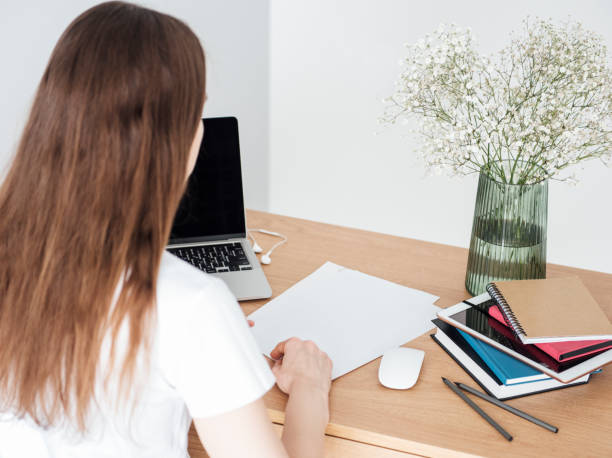 istock Young girl working at home office 1317388717