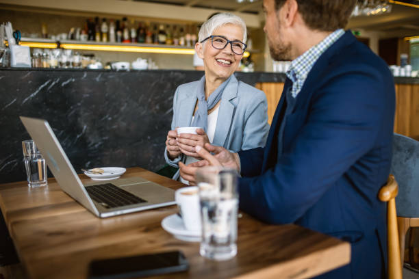 istock Business people having coffee 1317389968