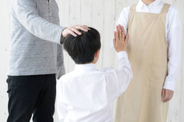 istock Paised child by father and mother 1317390773