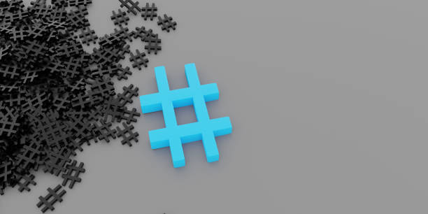 Hashtag Concept. Blue hashtag near the stack of dark ones on a grey banner background