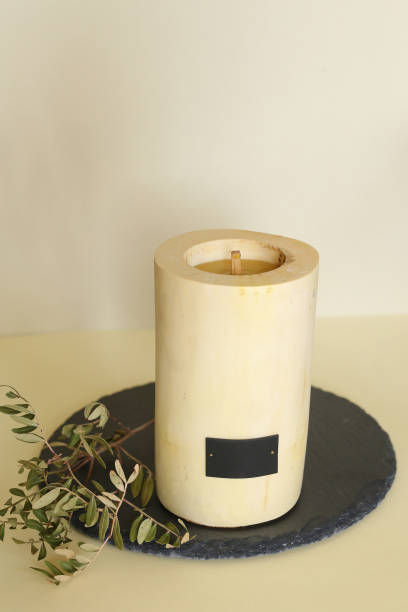 istock Wooden candle holder rustic interior centerpiece with candles in a cozy barn setting 1317393330