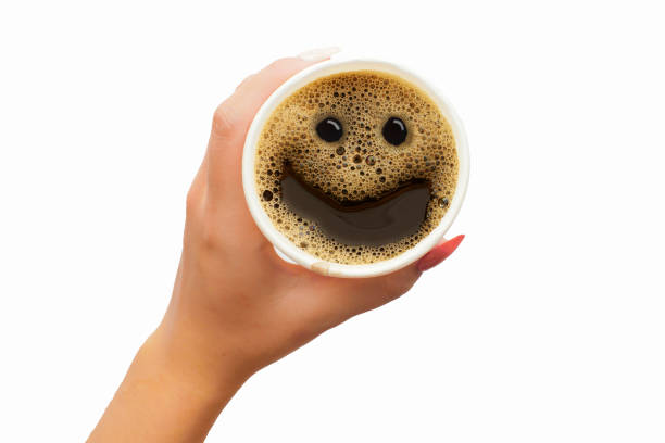 froth milk foam smiles in a cup of coffee stock photo