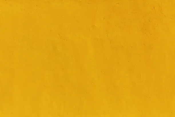 Photo of Yellow wall surface texture