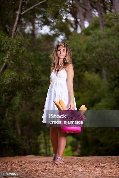 Woman With Bread In The Basket Stock Photo - Download Image Now - Adult, Adults Only, Arms Raised